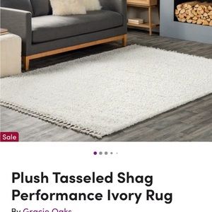 Cream tasseled rug :)